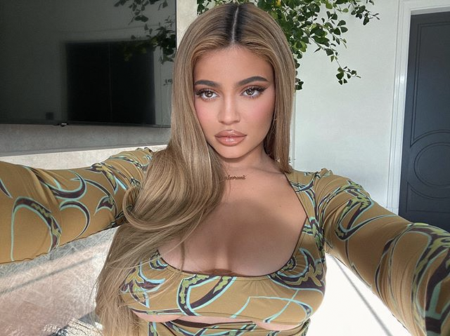 Kylie Jenner Showed Off Her Baby Bump in a Plunging Minidress