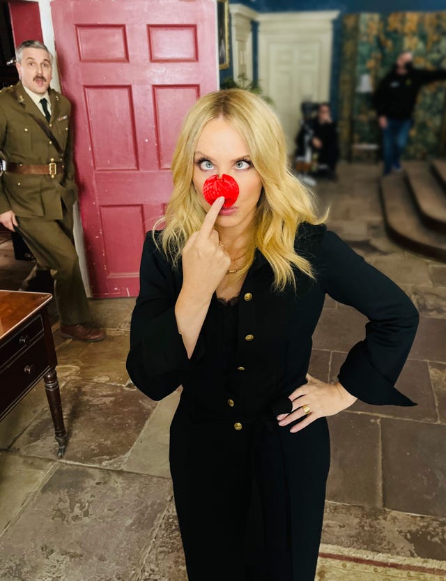 kylie minogue pokes her red nose for the ghosts red nose day sketch