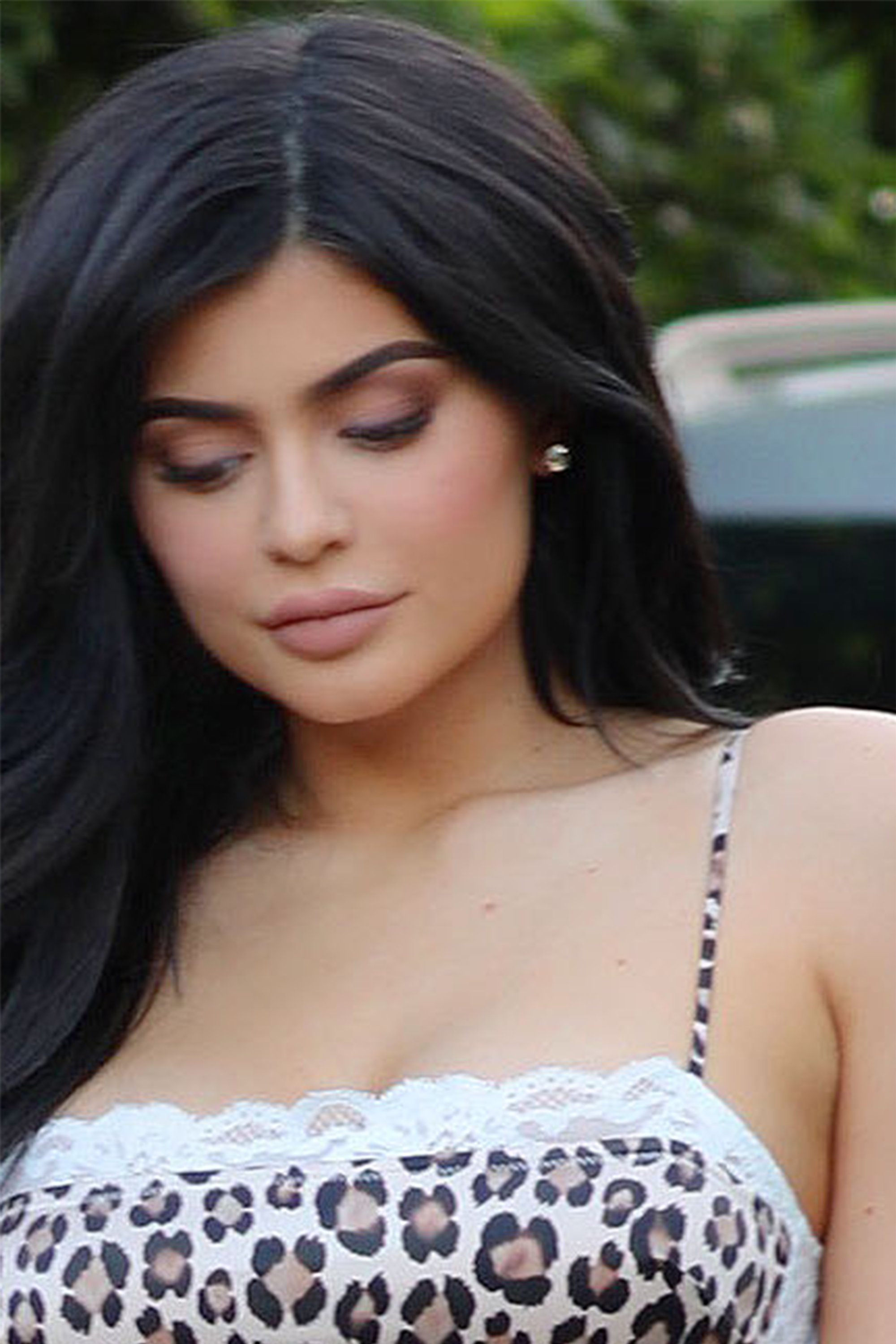 Kylie Jenner Slays in Animal Print Bralette With Silver Mini Skirt