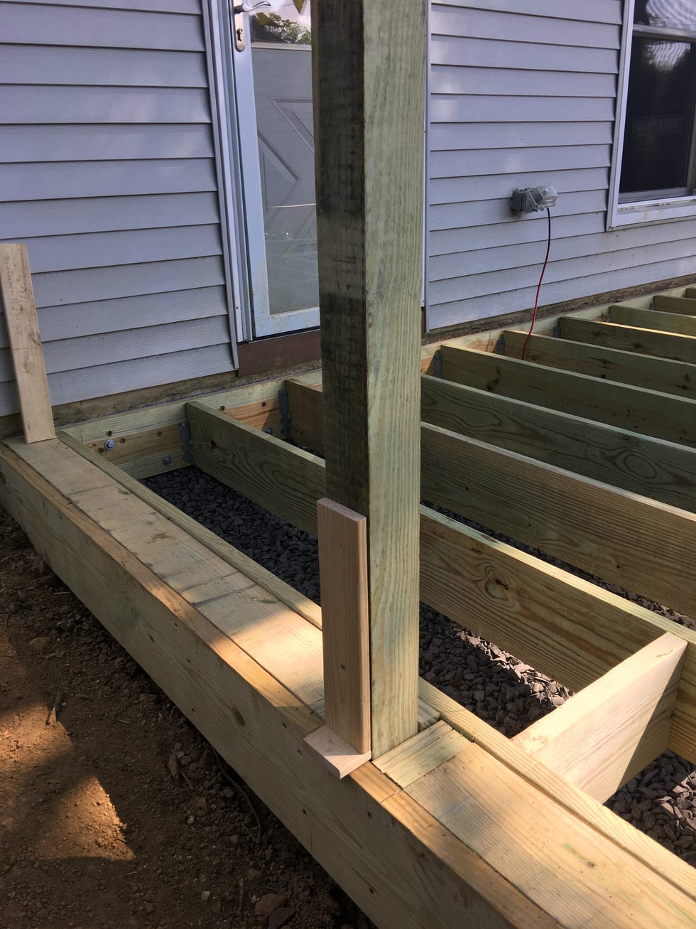 a deck with a railing