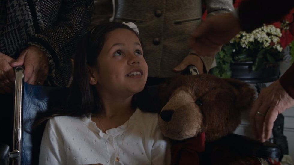 Woman holding a teddy bear