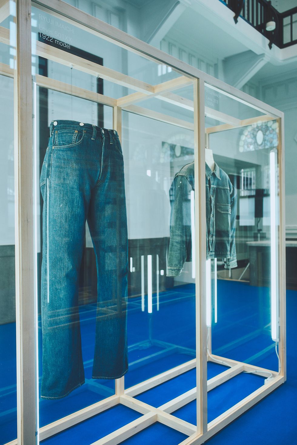 a pair of blue jeans on display