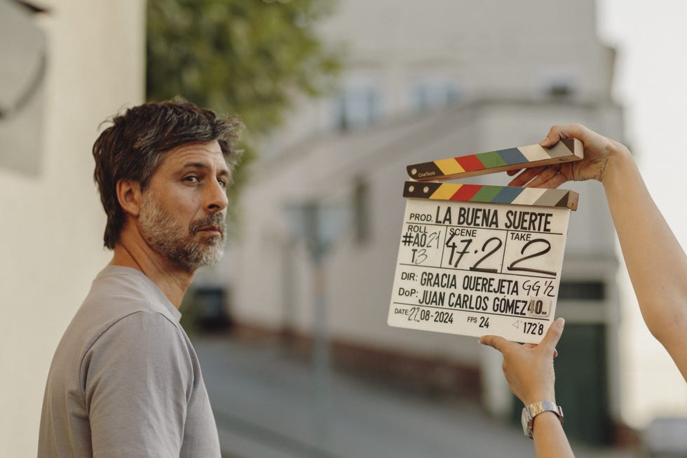 clapperboard with production details in a filming setting