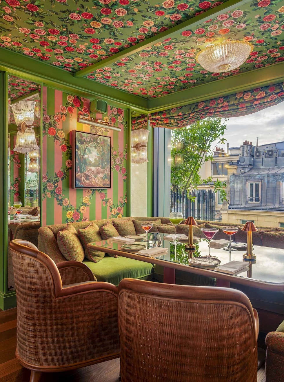 a dining area at la fantaisie hotel in paris.