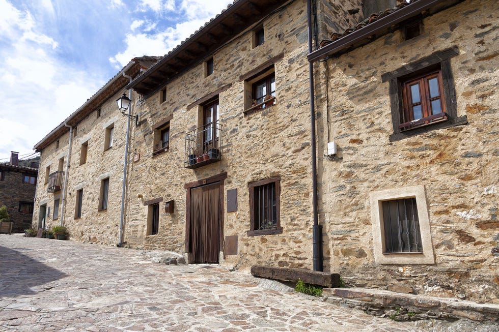 a stone building with windows