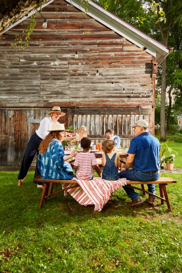 family eating picnic outdoors