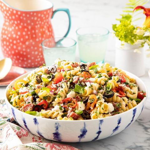 italian pasta salad in blue and white bowl