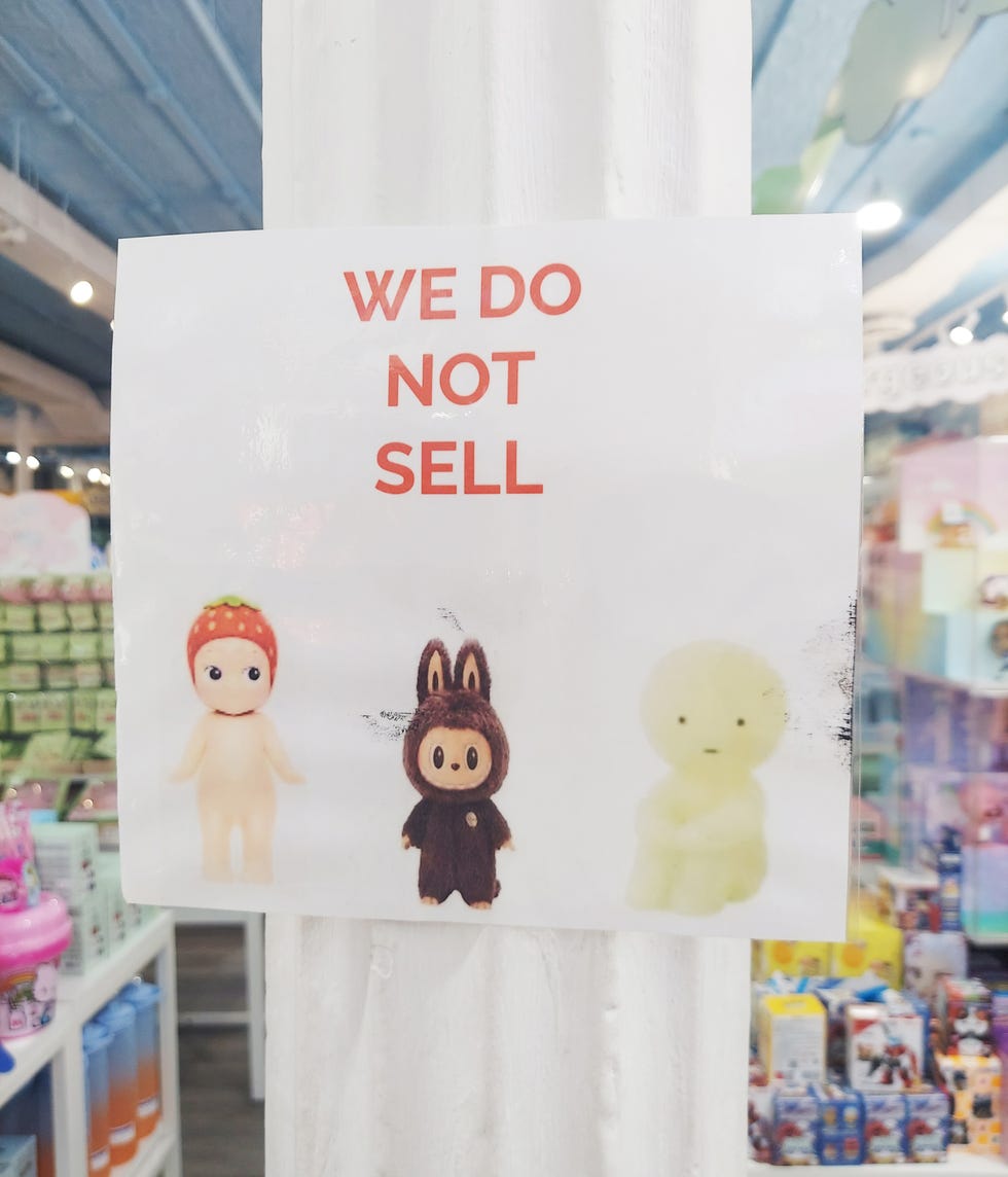 notice indicating that certain figurines are not for sale