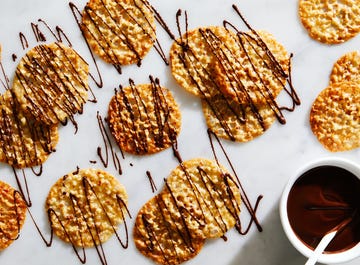 golden lace cookies drizzled with chocolate