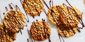 golden lace cookies drizzled with chocolate