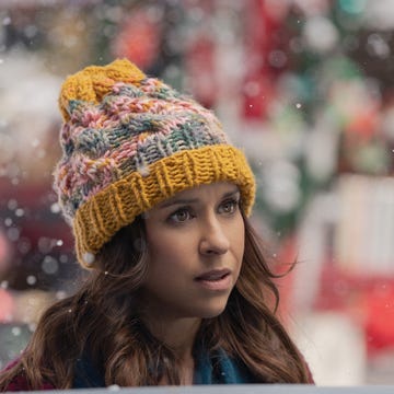 lacey chabert in hot frosty, standing in snow wearing knit cap lacey chabert in hot frosty, standing in snow wearing knit cap