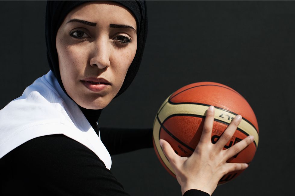 Amal Mohammad Awad, a Qatari basketball player, in Brigitte Lacombe’s ‘Hey’Ya: Arab Women in Sport’