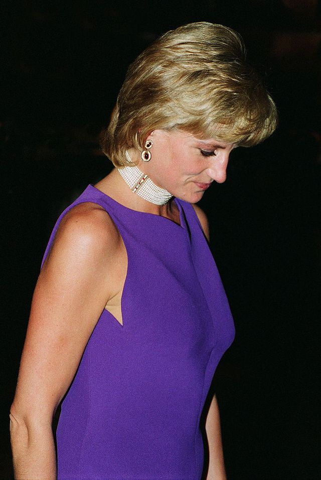 chicago, united states   june 05  diana, princess of wales,  looking pensive as she leaves a gala dinner held at the field museum of natural history  the princess is wearing a purple evening dress designed by versace  photo by tim graham photo library via getty images
