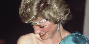 melbourne, australia   october 31 diana, princess of wales, wearing a green satin evening dress designed by david and elizabeth emanuel and an emerald necklace as a headband, attends a gala dinner dance at the southern cross hotel on october 31, 1985 in melbourne, australia  photo by anwar husseinwireimage