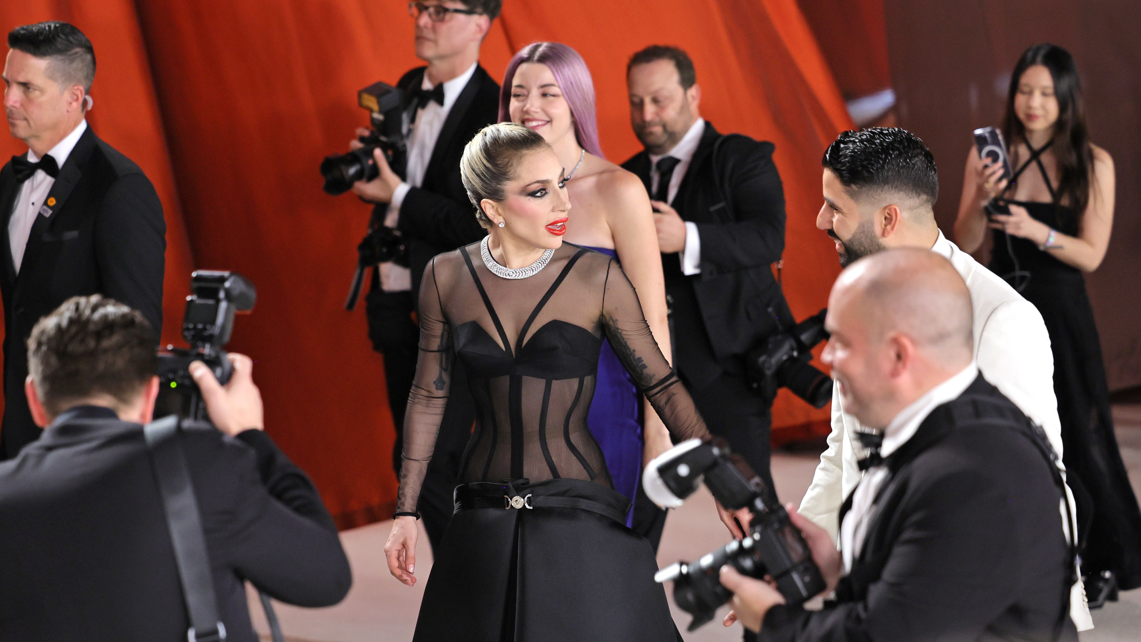 Watch Lady Gaga Help Fallen Photographer on Oscars Red Carpet