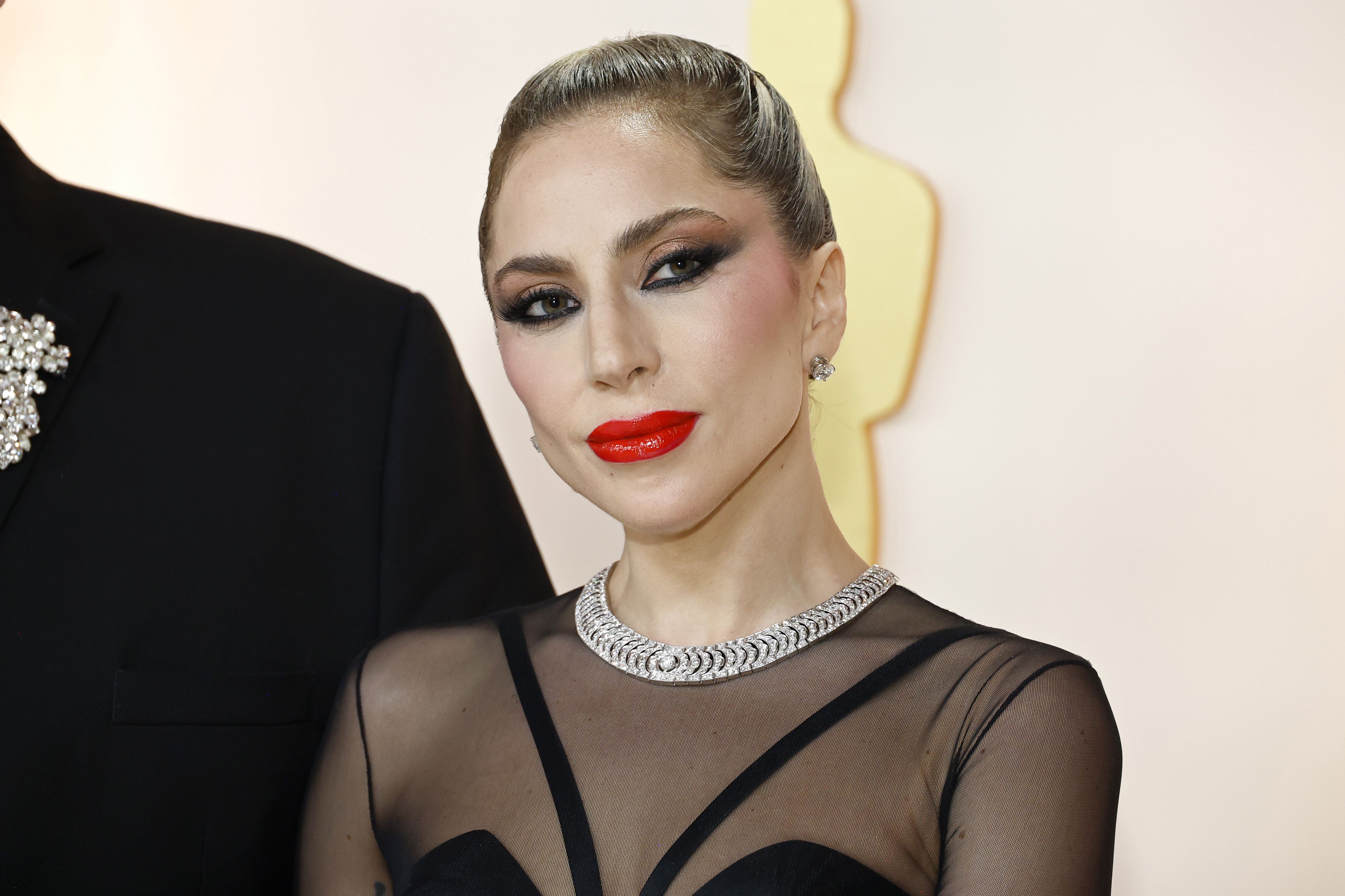 Lady Gaga Shows Peek Of 🔥 Abs, Butt In Sheer Dress In Oscars Pics