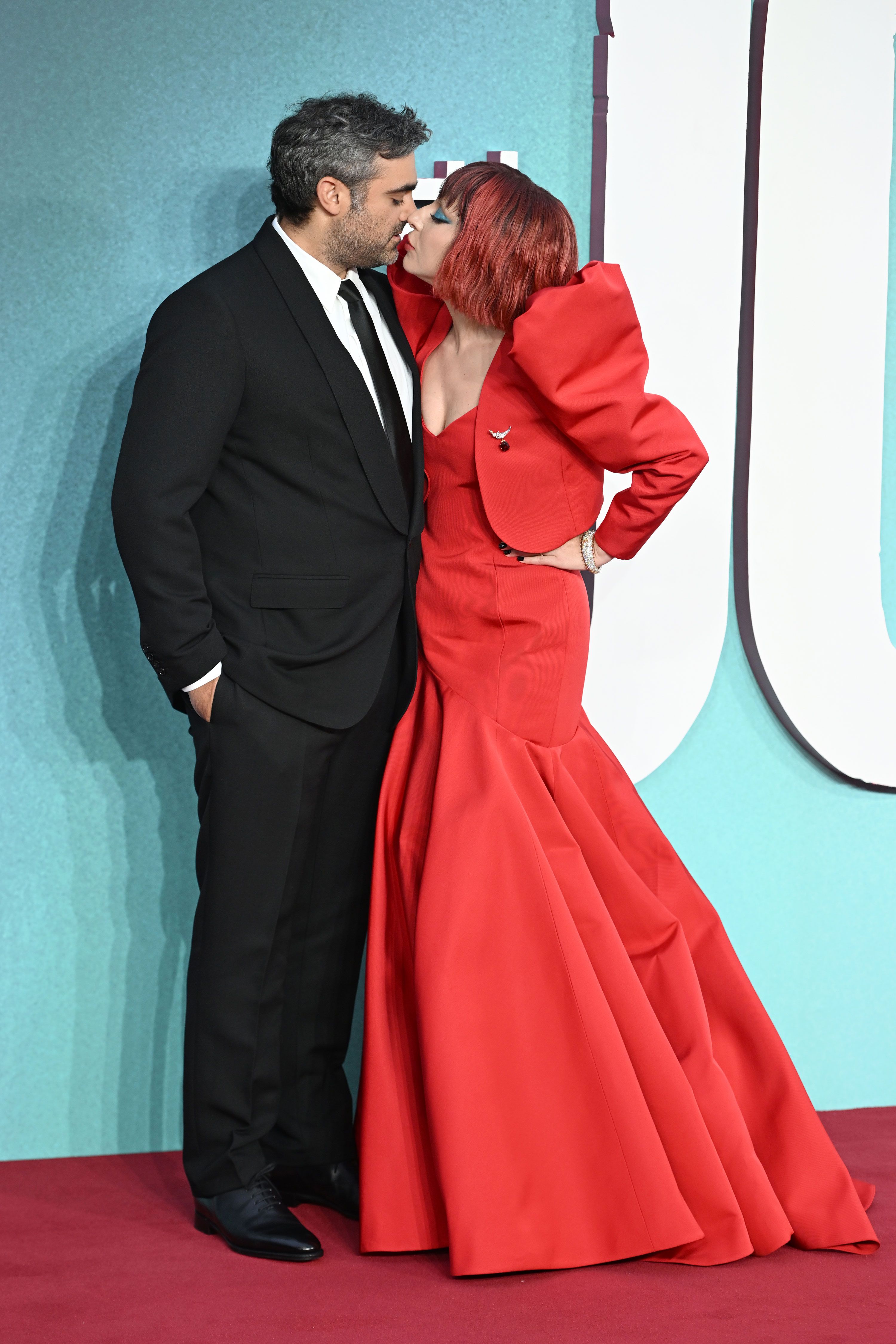 Lady Gaga Wears Dramatic Red Gown to Joker Folie a Deux U.K. Premiere