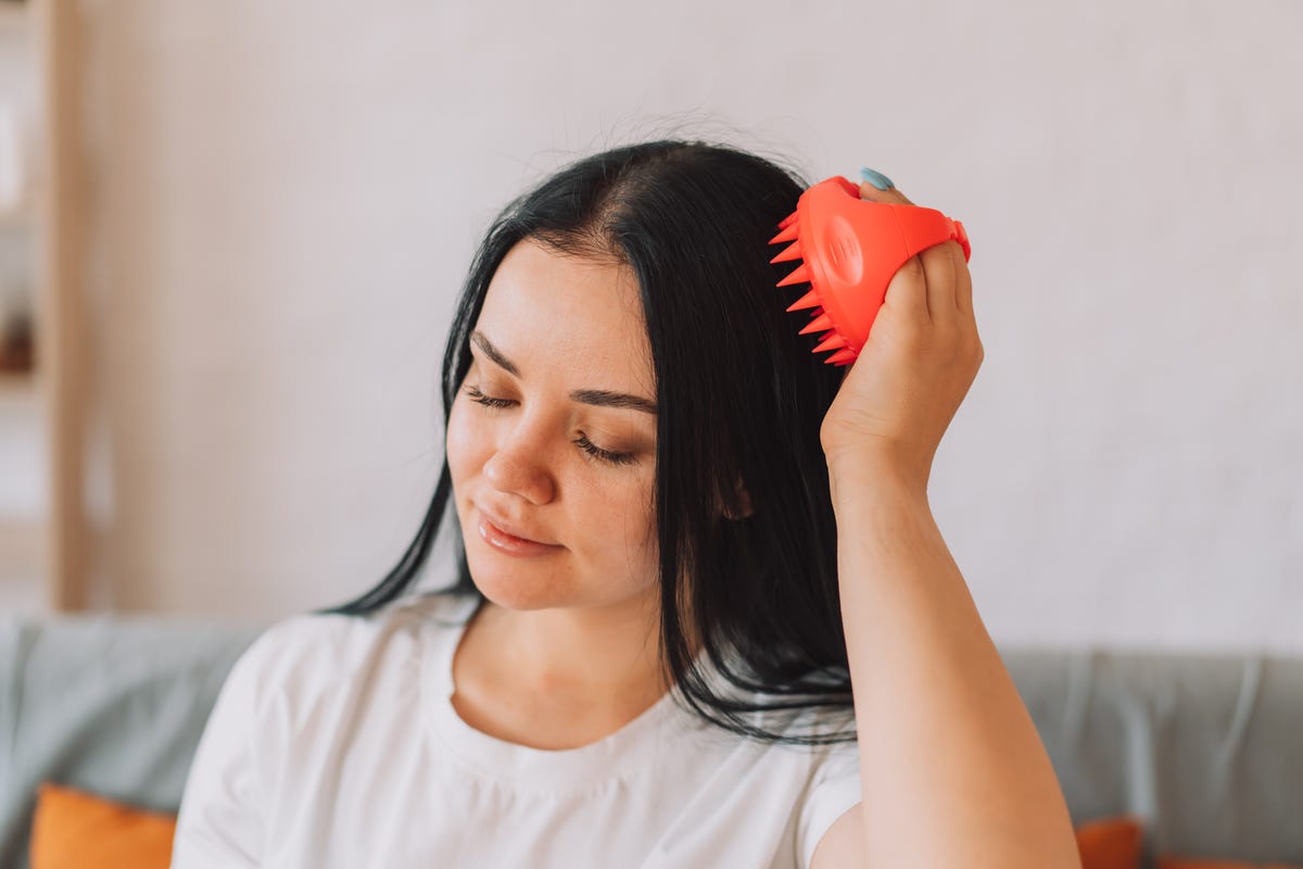 Here’s Why You Should Add a Scalp Massager to Your Wash Day Routine