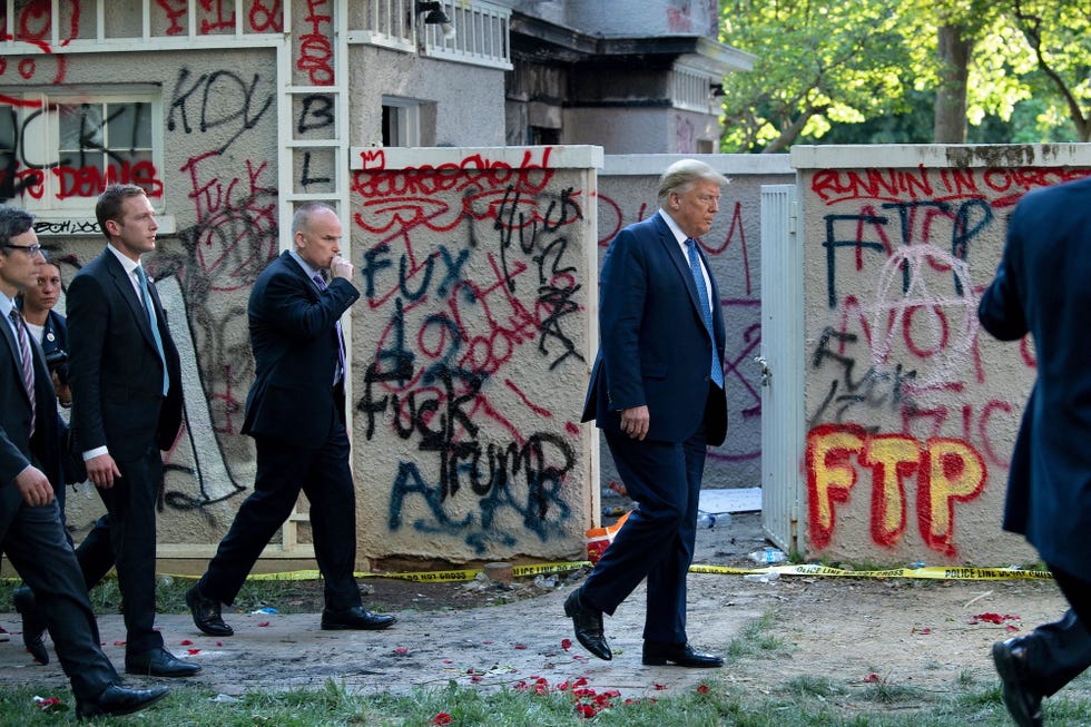 us president donald trump walks back to the white house escorted by the secret service after appearing outside of st john's episcopal church across lafayette park in washington, dc on june 1, 2020   us president donald trump was due to make a televised address to the nation on monday after days of anti racism protests against police brutality that have erupted into violencethe white house announced that the president would make remarks imminently after he has been criticized for not publicly addressing in the crisis in recent days photo by brendan smialowski  afp photo by brendan smialowskiafp via getty images