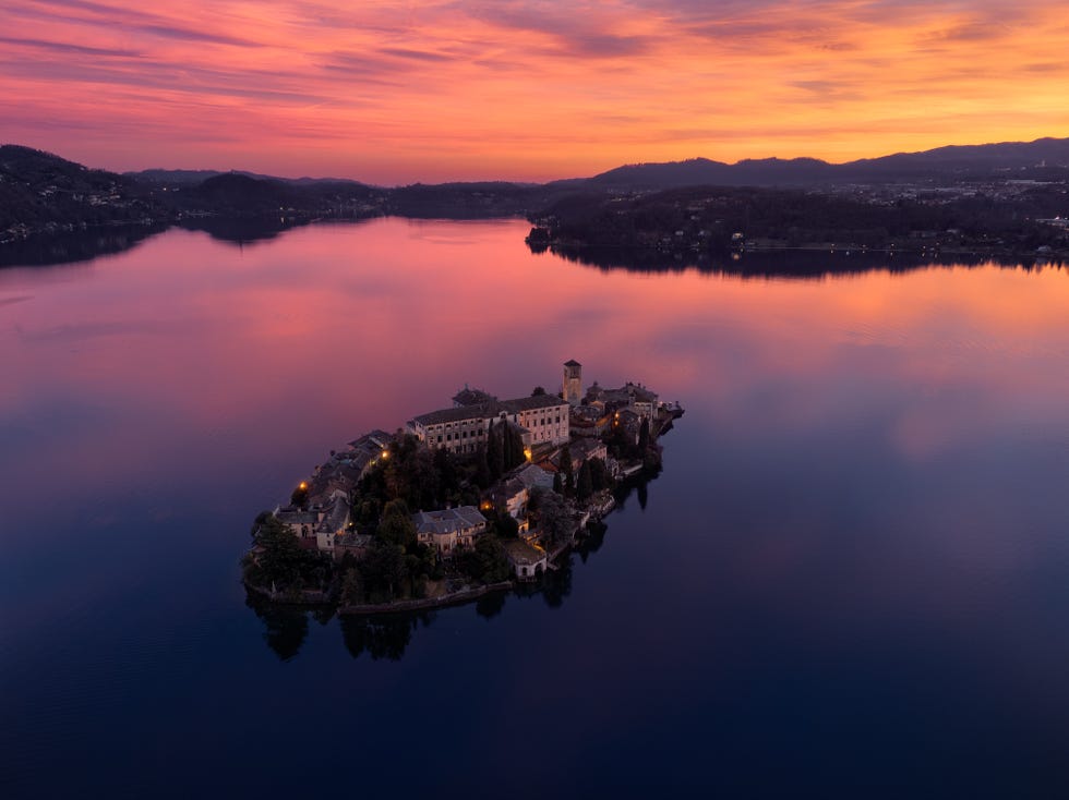 lake orta and san giulio island at sunset, verbanio cusio ossola province, piedmont, italy