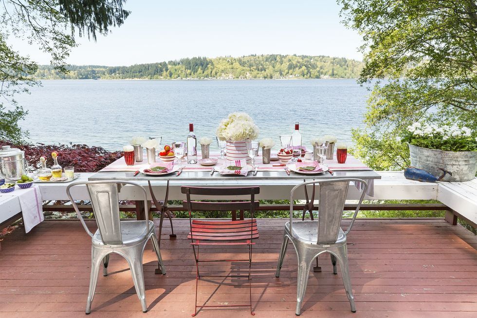dining table on lakefront deck