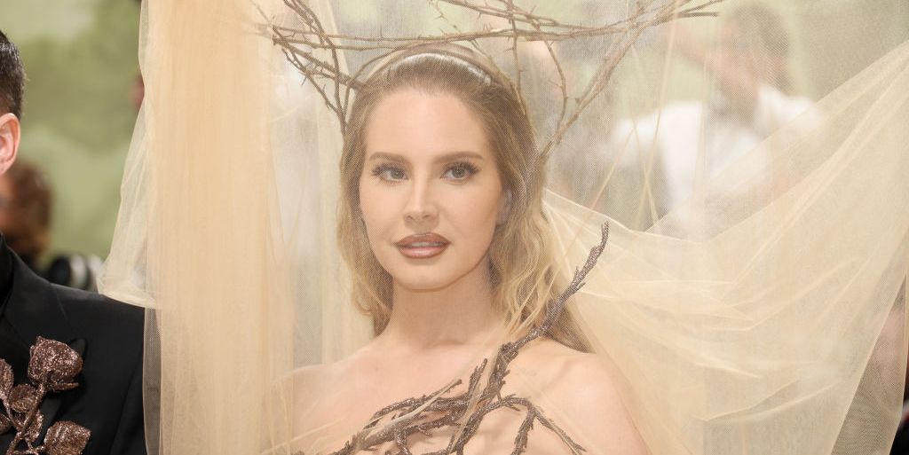 Lana Del Rey's 2024 Met Gala Look Is Completely Sheer and Decked Out in Tree Branches