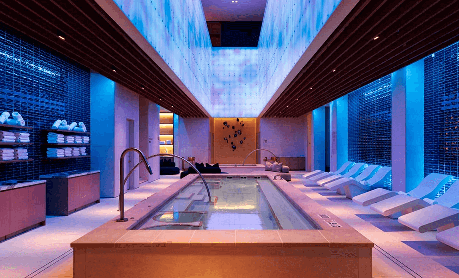spa interior with a pool and relaxation area
