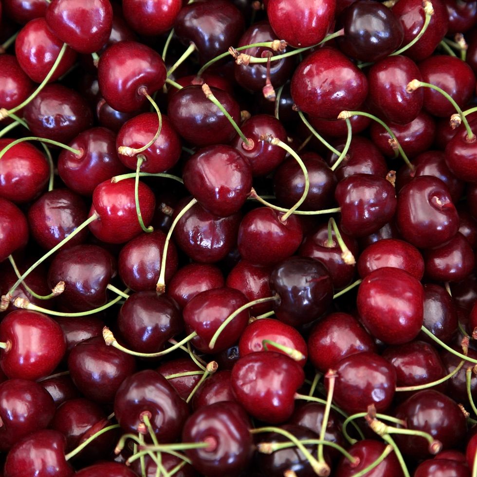Large collection of fresh red cherries