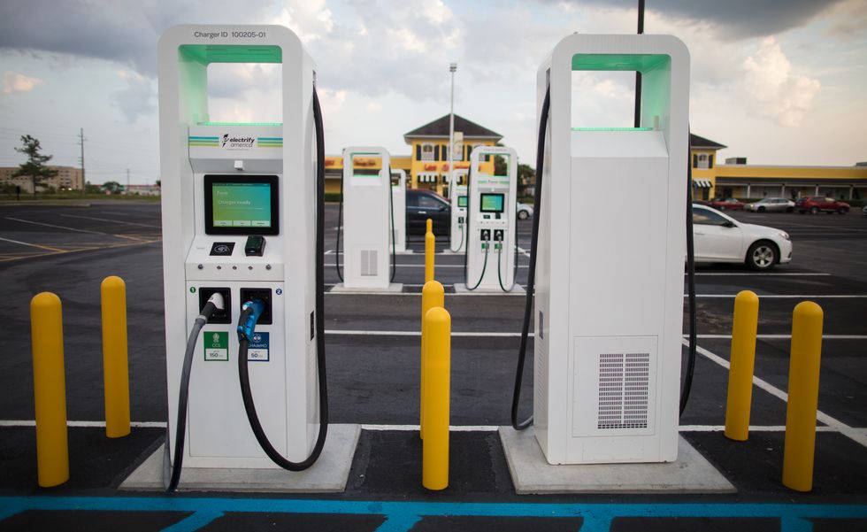 Gas pump, Filling station, Gasoline, Fuel, Technology, Machine, Gas, Electronic device, Parking, Diesel fuel, 