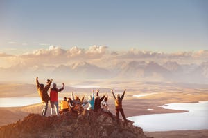 large group of happy friends in mountains area