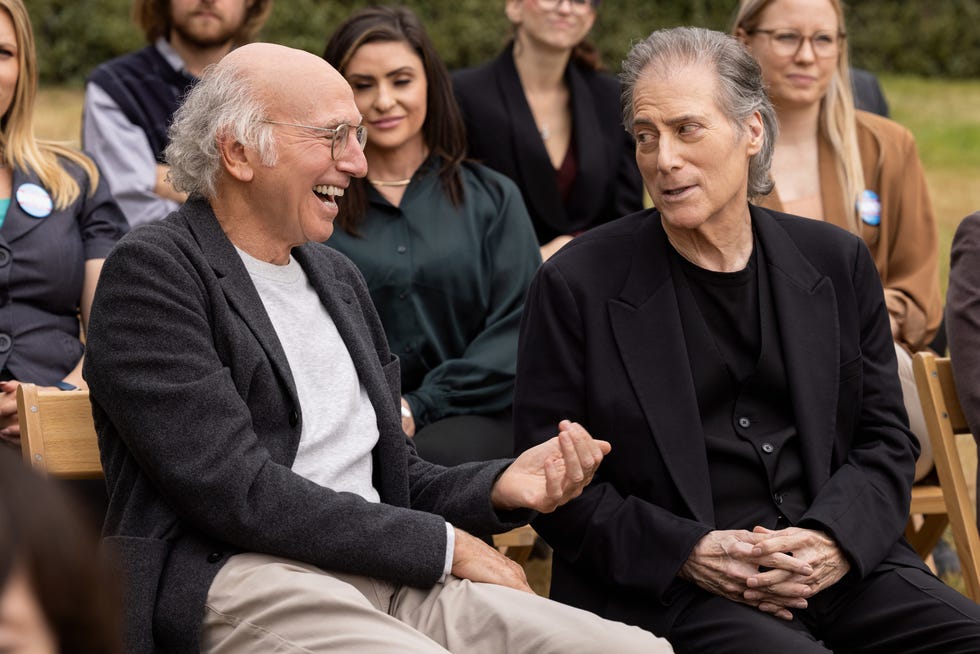 a man and woman sitting next to each other