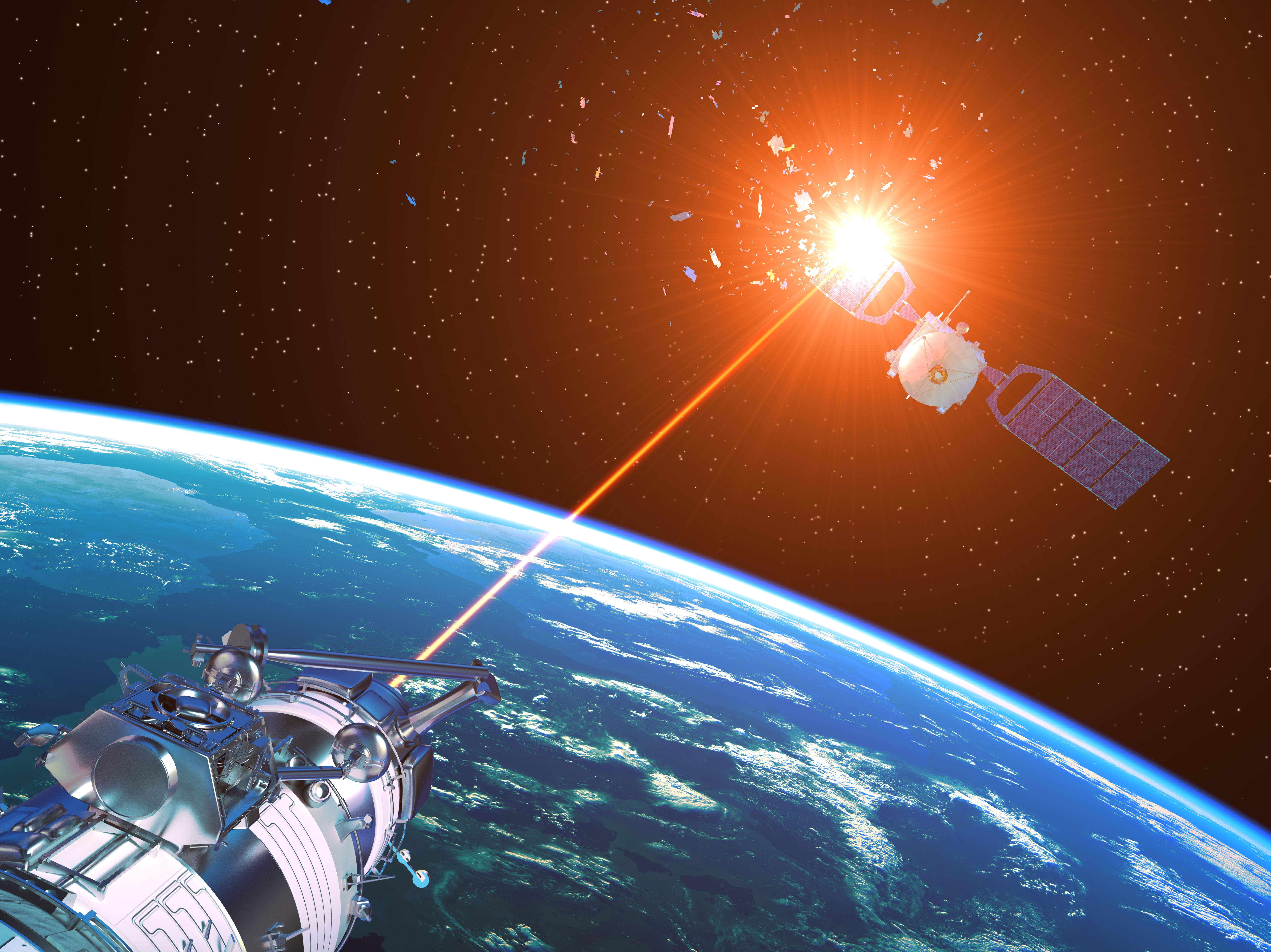 laser-cannon-incapacitates-enemy-satellite-in-space-royalty-free-image-1742496387.pjpeg