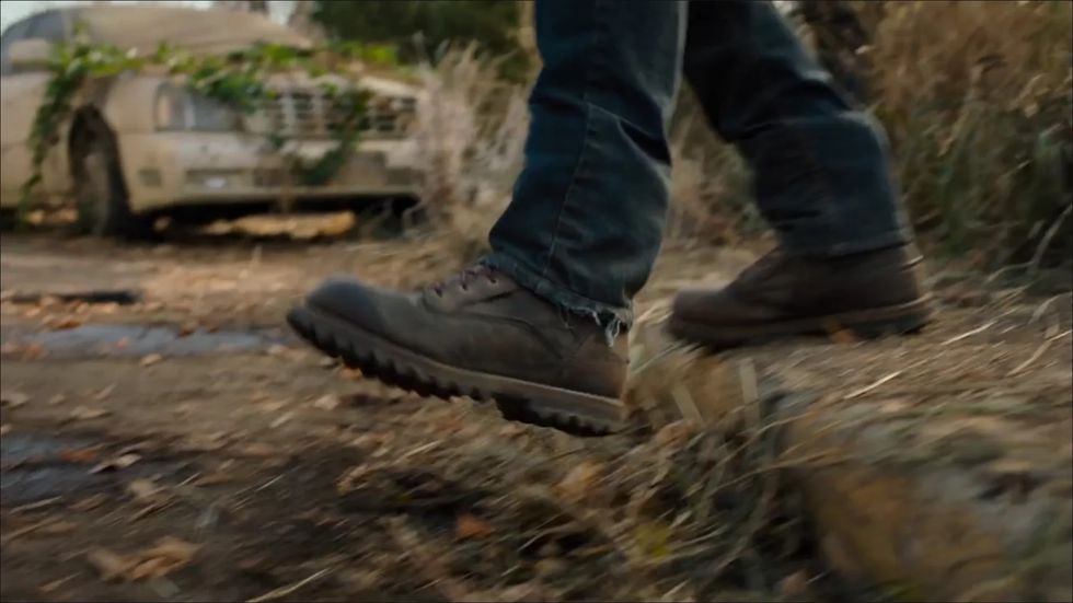 hbo last of us boots in a forest