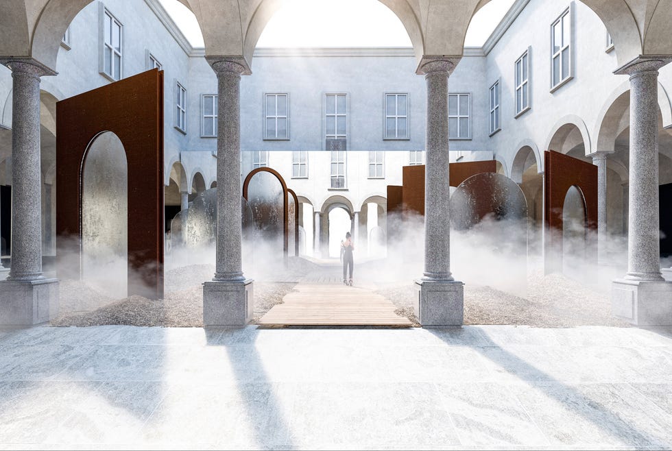 a person standing in a courtyard