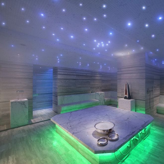 contemporary spa interior with marble surfaces and ambient lighting