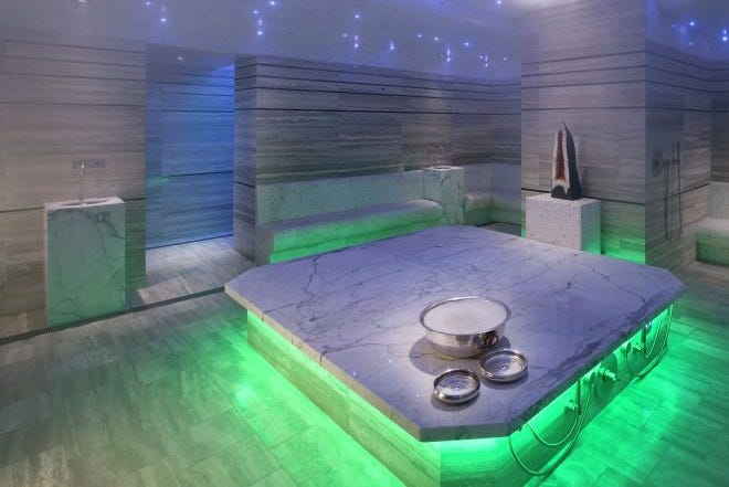 contemporary spa interior with marble surfaces and ambient lighting contemporary spa interior with marble surfaces and ambient lighting
