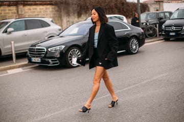 a person walking in a parking lot