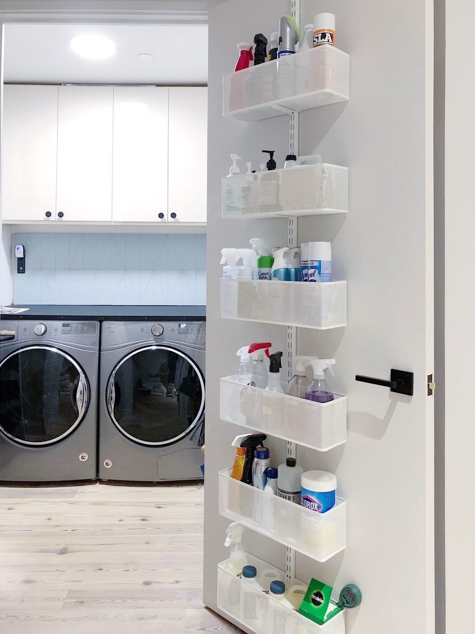 laundry room with over the door organizer