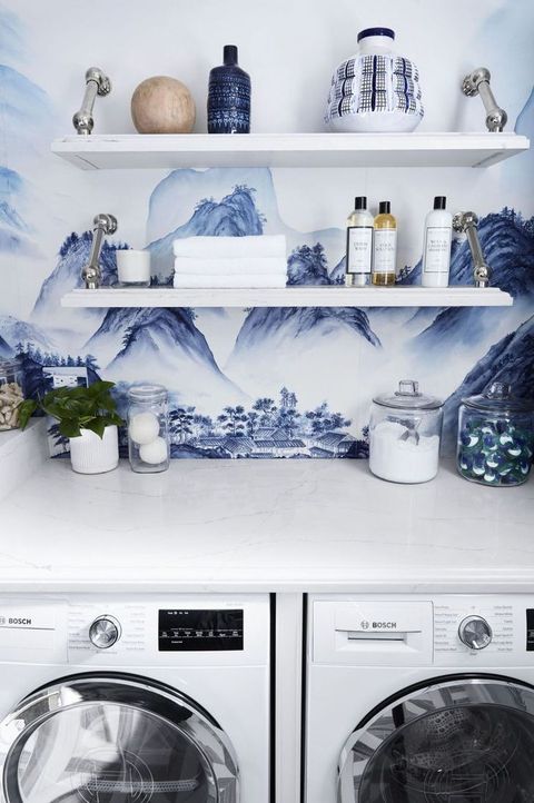 laundry room with mountain mural wallpaper