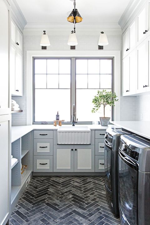 laundry room with herringbone tile floor