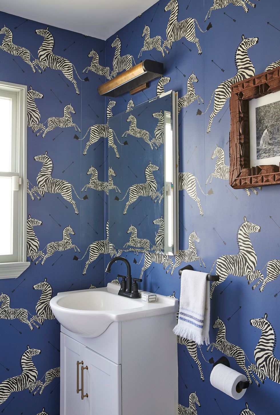 bathroom with zebra wallpaper