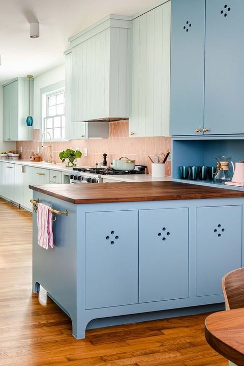 pastel blue kitchen island with butcher block