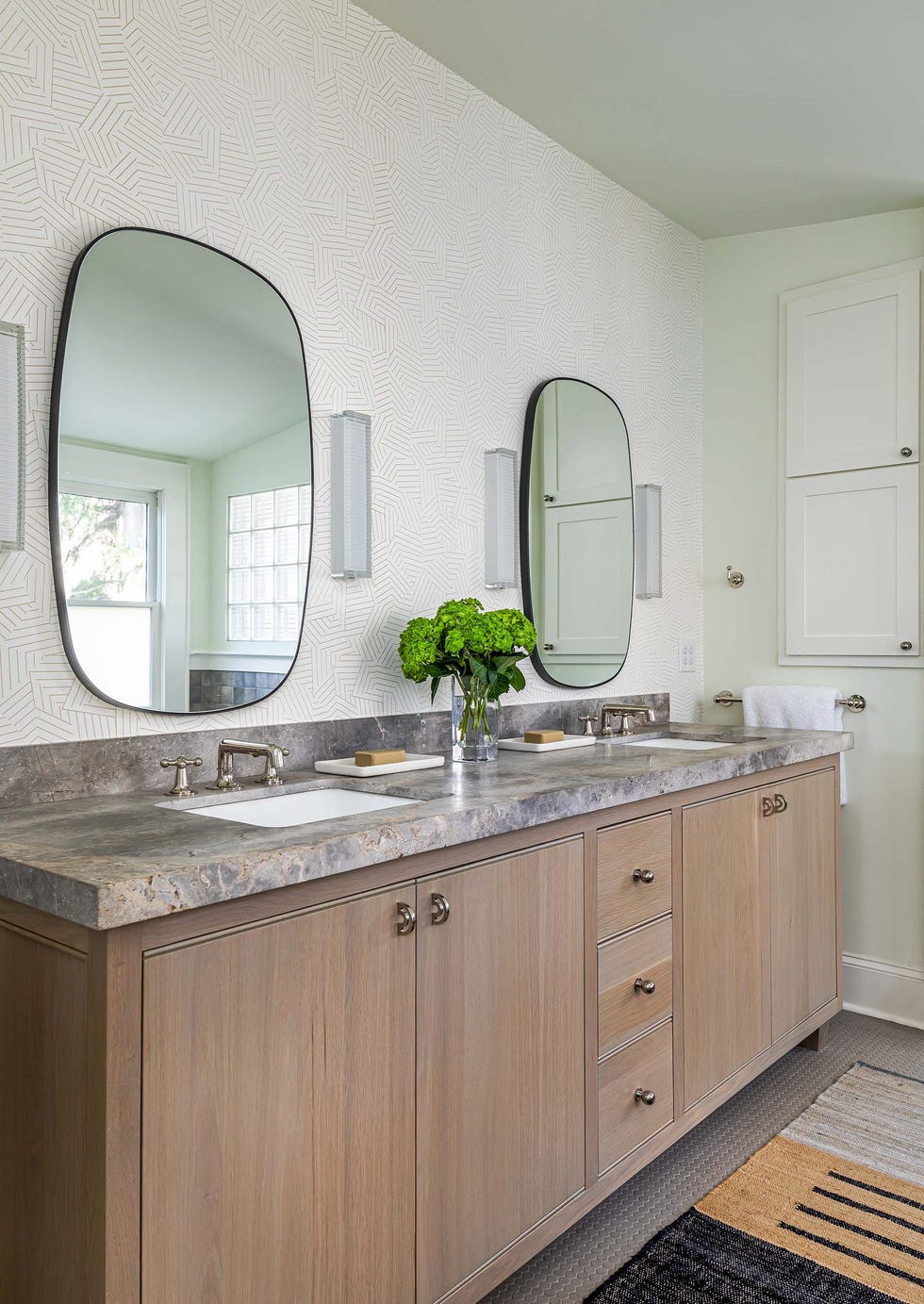 a bathroom with a large mirror