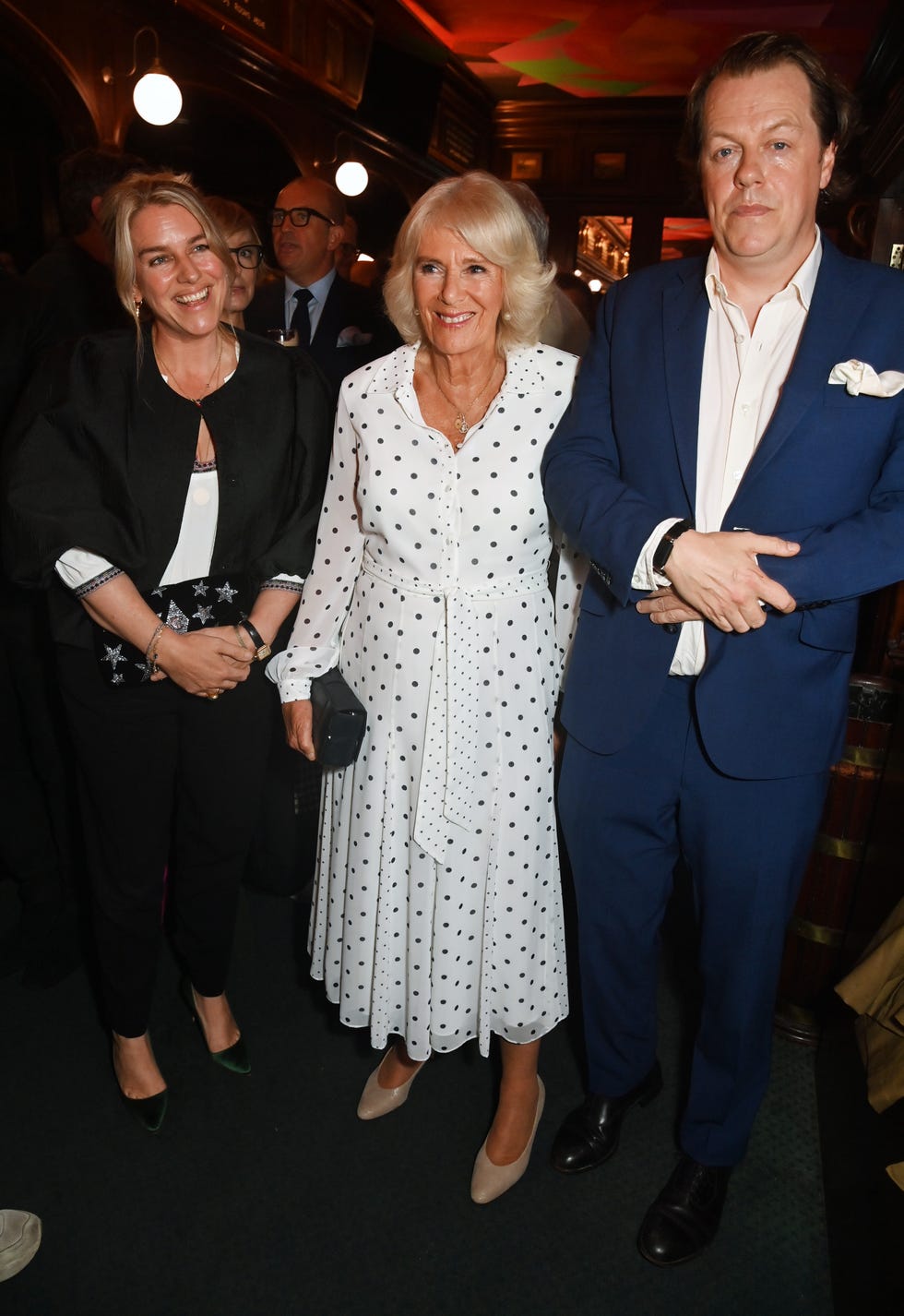 la reina y sus hijos en la presentacion del libro cookin and the crown