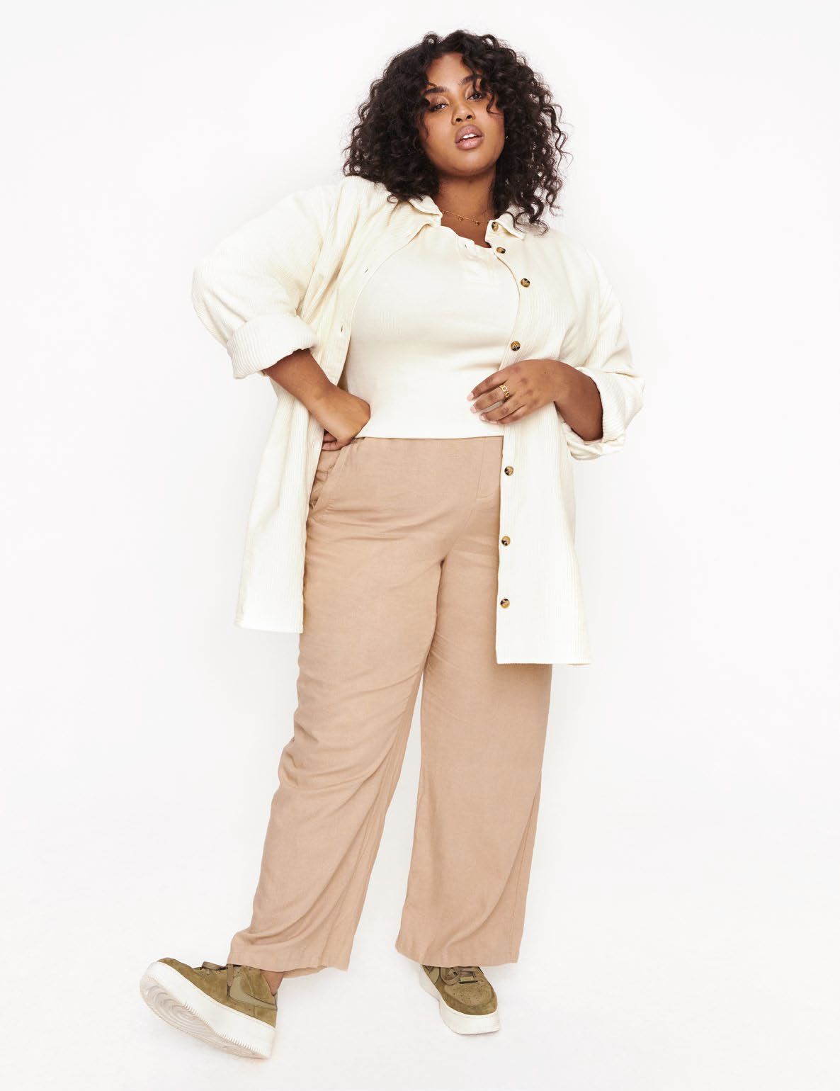 Buy Online Women Brown Solid HighRise Pleated Trousers at best price   Plussin