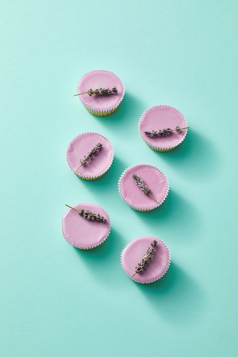 sugared lavender cupcakes for spring on a blue background