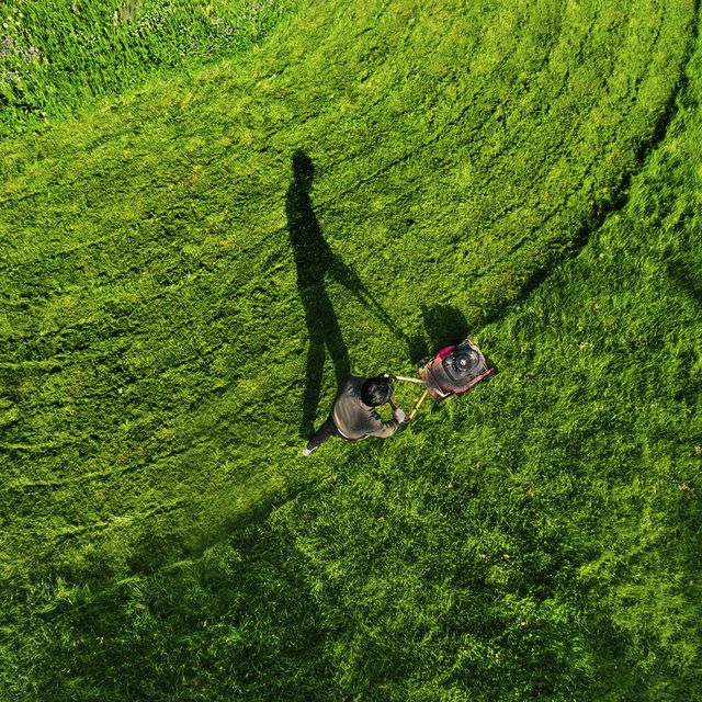 how to mow lawn man in field