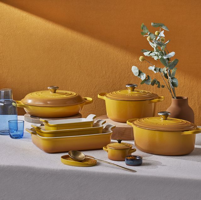 https://hips.hearstapps.com/hmg-prod/images/le-creuset-new-nectar-yellow-collection-full-64de4f20ecaf9.jpg?crop=0.669xw:1.00xh;0.166xw,0&resize=640:*