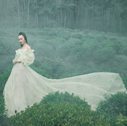 People in nature, Dress, Green, Atmospheric phenomenon, Beauty, Gown, Wedding dress, Grass, Tree, Photography, 