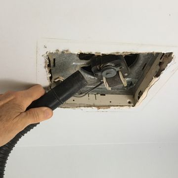 cleaning a ceiling vent